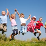 children jumping in the air