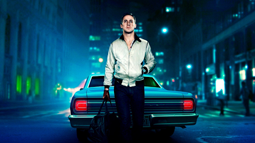 Ryan Gosling leaning up against his car in the movie Drive