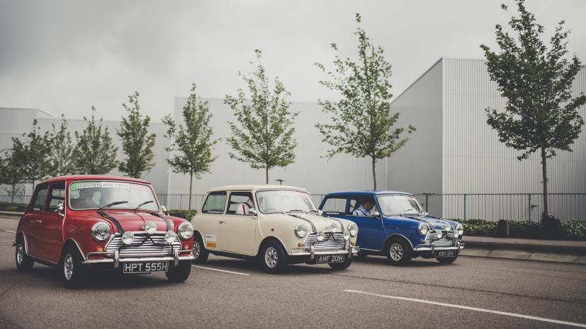 A red, cream, and blue 1969 Mini Cooper S