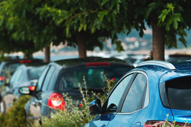 Parked cars on a street.